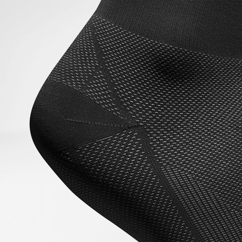 Compressiesokken Regeneratie Zwarte detailhak Gedetailleerd beeld van het hielgebied van de sportsok voor regeneratie