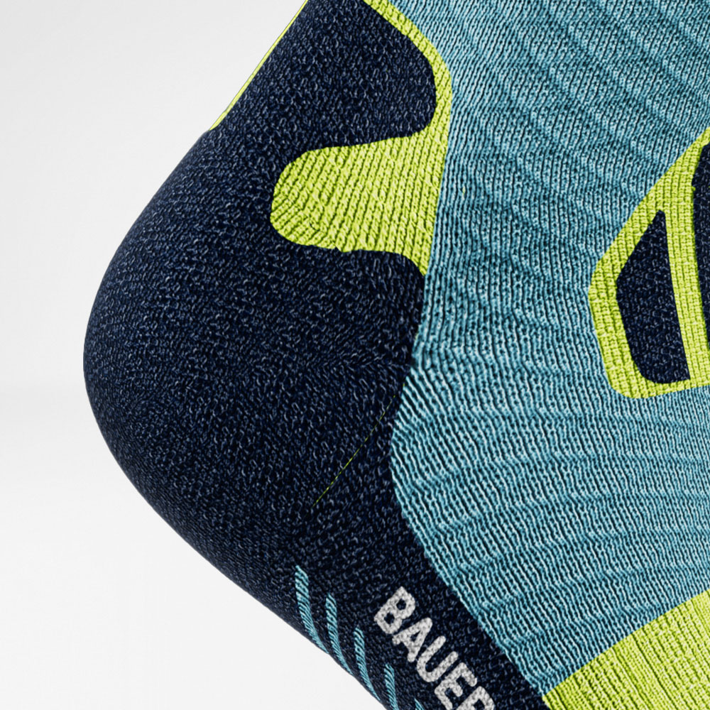 Trailrun Running Socks Blue Geel Detail Heel Protection Gedetailleerde weergave Hiel van de blauwe en gele Trail -run - lopende sokken