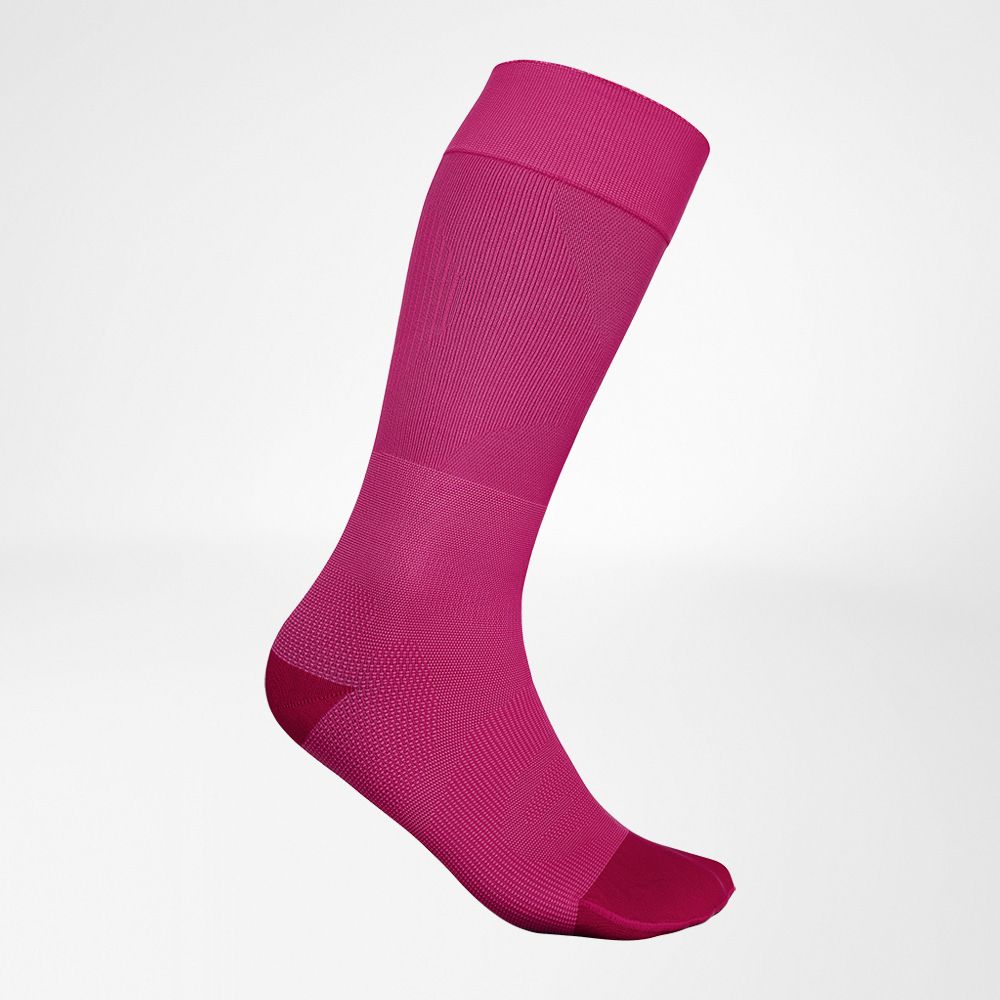 Zijaanzicht van de roze dunne ski -jas