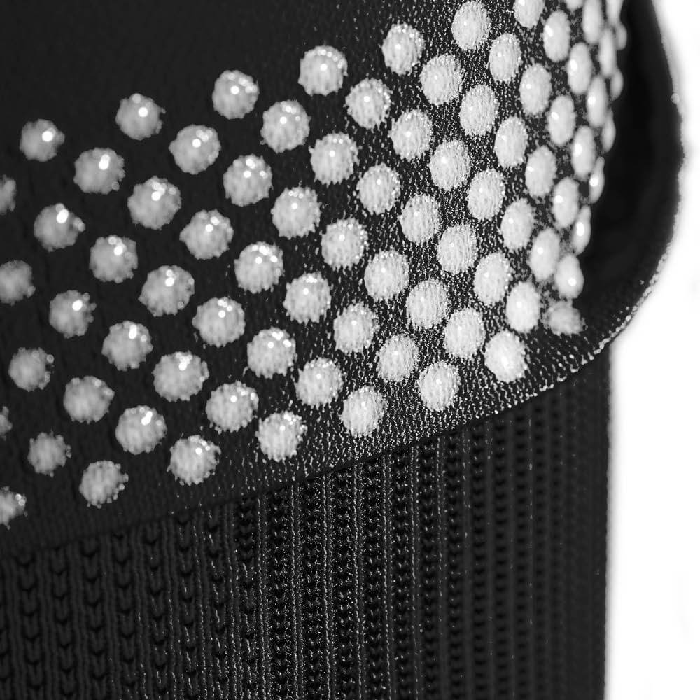 Gedetailleerd beeld van een zwarte NBA -kniehoest met het bovenste deel en uitzicht op de siliconengenezing Nops